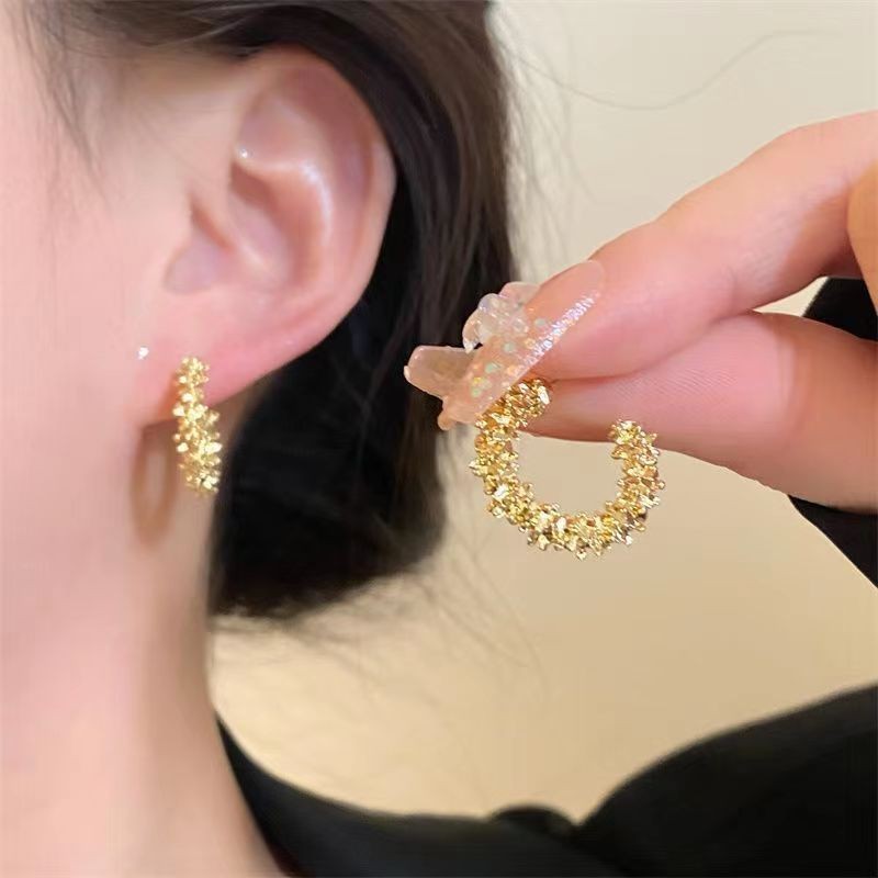 Small broken silver earrings-gold