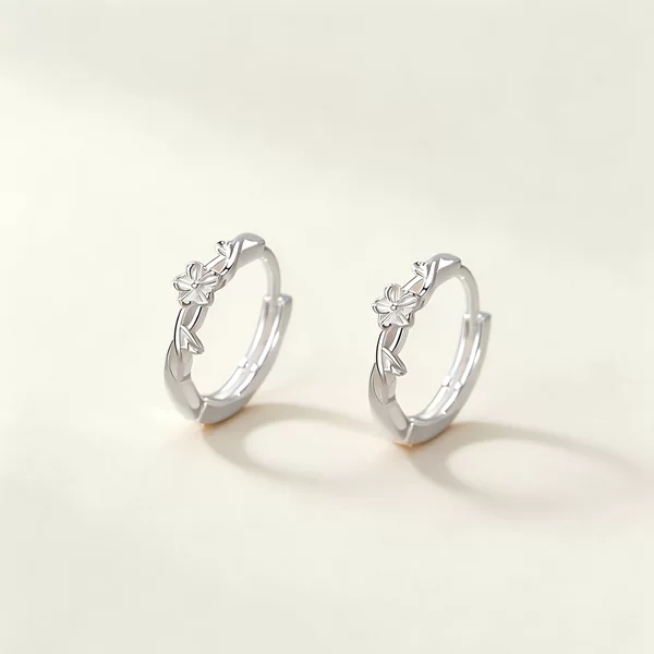 S999 silver, delicate floral branch earrings, a stylish and versatile accessory for women, offering a touch of understated luxury and a unique, high-end aesthetic