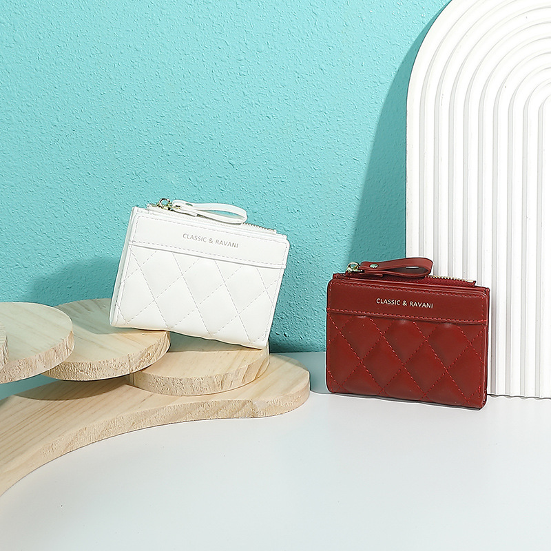 2025 primavera nueva Europa y los Estados Unidos nueva billetera en mujeres corta cremallera de diamante bordado moda alta 20% de descuento