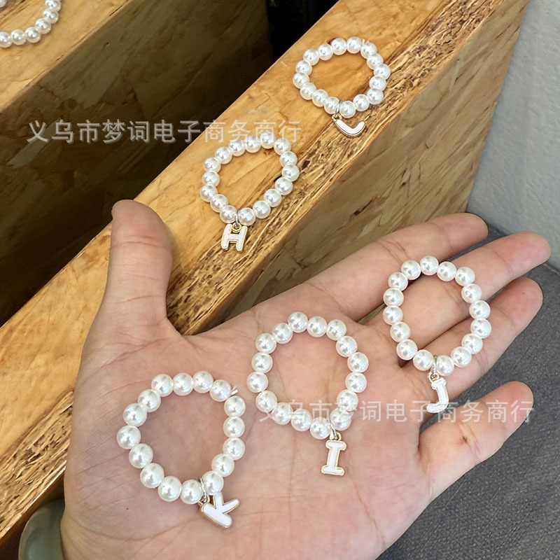 Creative Labubu First, Second and Third Generation Blind Box Mini Labubu Pendant 26 Letters Pearl Necklace Accessories Baby Clothes
