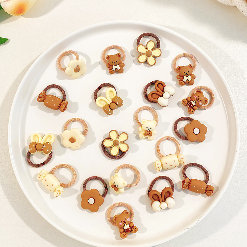 La cuerda del lazo del pelo del bebé la banda del pelo del pulgar de los niños tocado cuerda del pelo del bebé la niña no duele los accesorios del pelo de las muchachas de la banda de goma del pelo