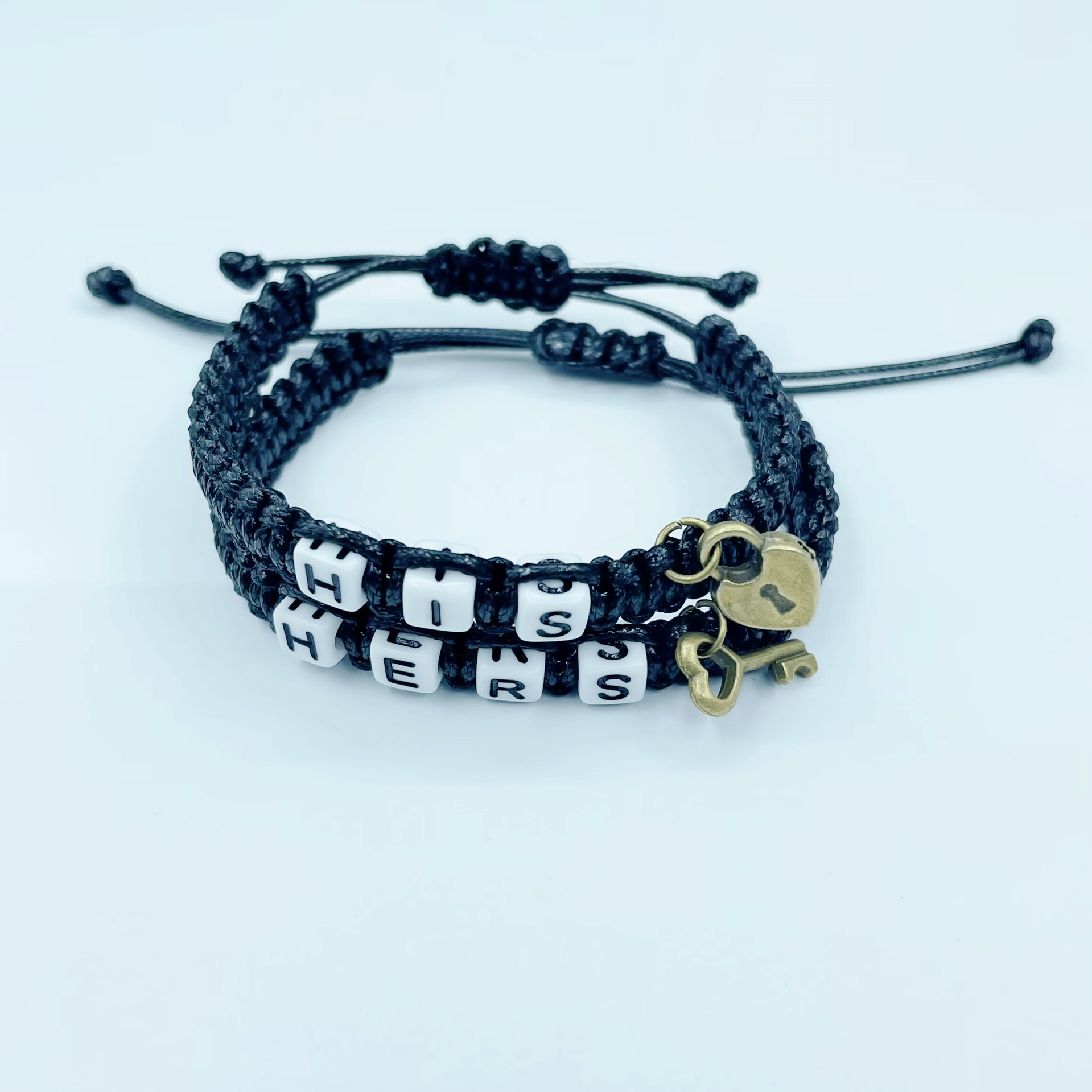Venta caliente europea y americana su HERS pareja pulsera cerradura núcleo clave colgante tejido cordón pulsera transfronteriza joyería al por mayor