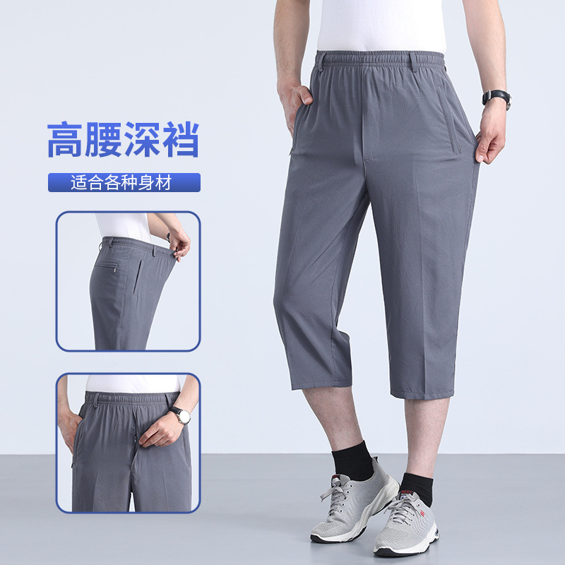 Pantalones de secado rápido de seda de hielo para hombres delgados cintura elástica de cintura media de 8 puntos pantalones cortos de mediana edad, jóvenes y delgados pantalones transpirables