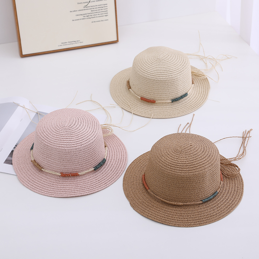 Versión coreana del nuevo sombrero femenino primavera y verano gran ala sombrero para el sol sombrero para el sol de vacaciones protector solar al aire libre sombrero de paja ajustable al por mayor