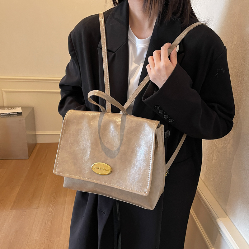 Mochila coreana retro de estilo universitario 2024 invierno nuevo simple de gran capacidad de mano mochila de hombro para viajar