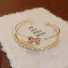Golden fuchsia bracelet