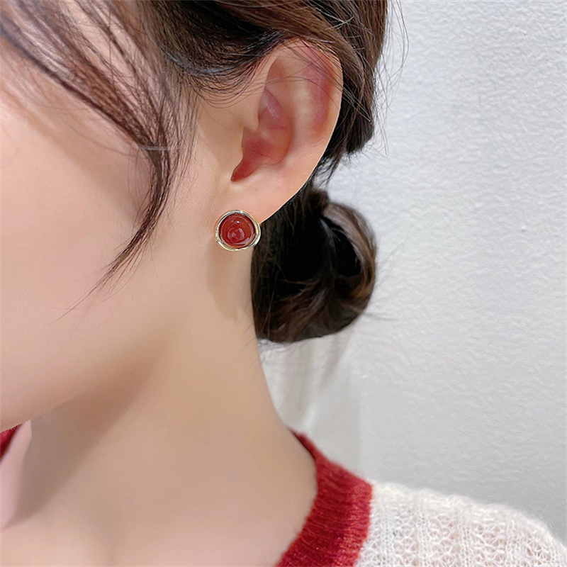 Simple Light Luxury Red Round Pearl Earrings Niche New Year 2022 New Trendy Earrings display picture 1