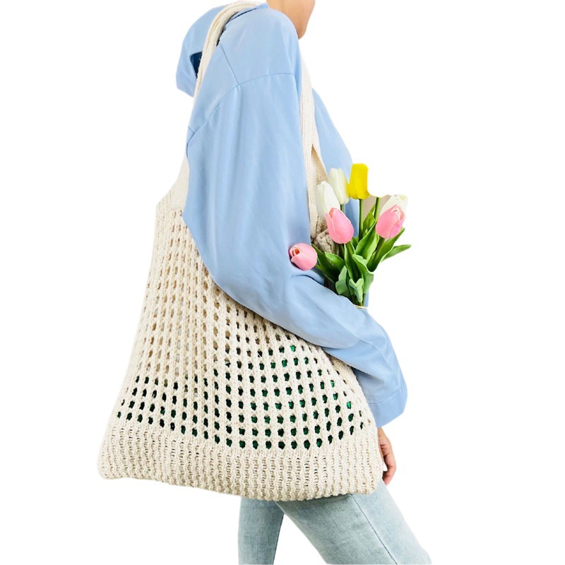 2023 nueva bolsa transfronteriza bolso de mano japonés y coreano bolsa de color sólido bolsa de punto bolsa hueca bolsa de hombro bolsa tejida