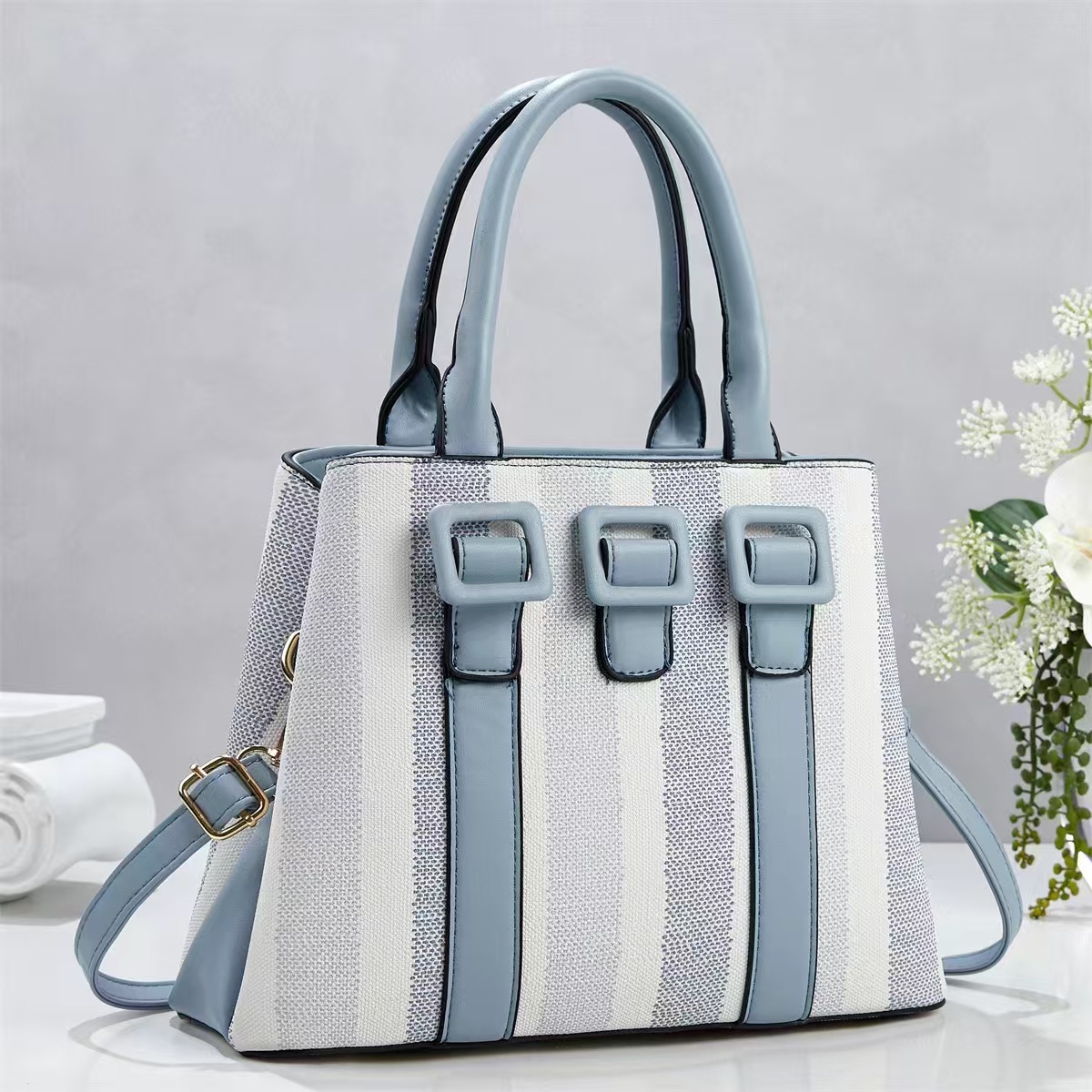 Bolsa de mano casuales a rayas simples temperamento de moda bolsas de hombro de viaje diario versátil mochila bolsas transfronterizas