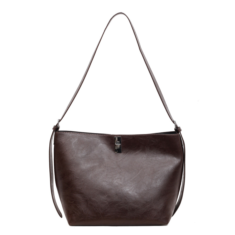 Bolsa de brazo retrógrada de gran capacidad para mujeres 2025 nueva moda coreana bolso especial simple bolso de cubo de hombro