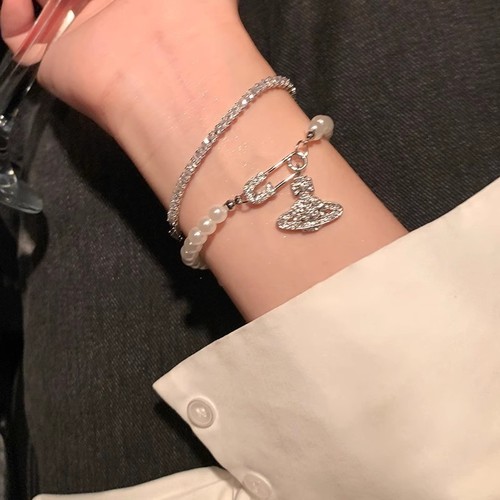 Western Empress Saturn Pearl Necklace for Women, Pin Star Planet, Light Luxury, Niche, Exquisite, New Arrival in 2025, High-End Accessory