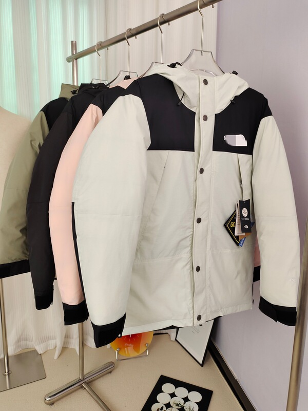 NORTH FACE's new men's hooded down jacket is soft, cold-resistant, and features GORE-TEX windproof and waterproof construction NORTH FACE's new men's hooded down jacket is soft, cold-resistant, and features GORE-TEX windproof and waterproof construction