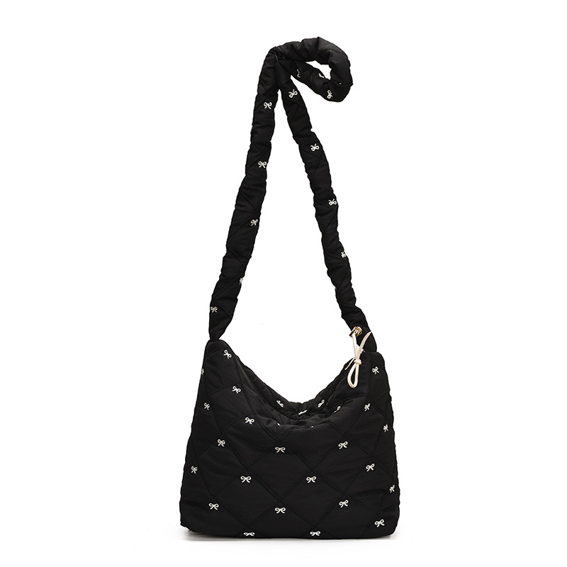 Otoño y invierno de gran capacidad para mujeres 2024 nuevo diseño de arco de bordado ligero de hombro mochila de viaje bolsa