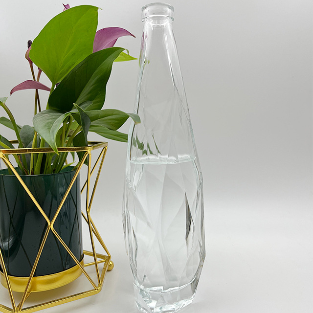 批发330 500ml矿泉水玻璃瓶依云同款水滴形玻璃瓶750ml苏打水空瓶