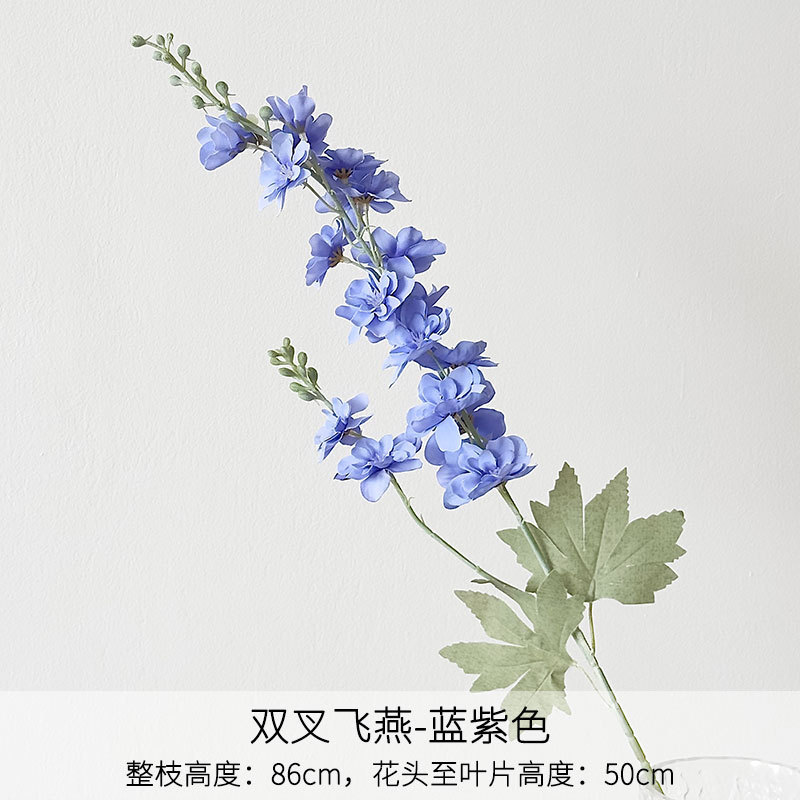 Golondrina voladora de doble tenedor azul y morado