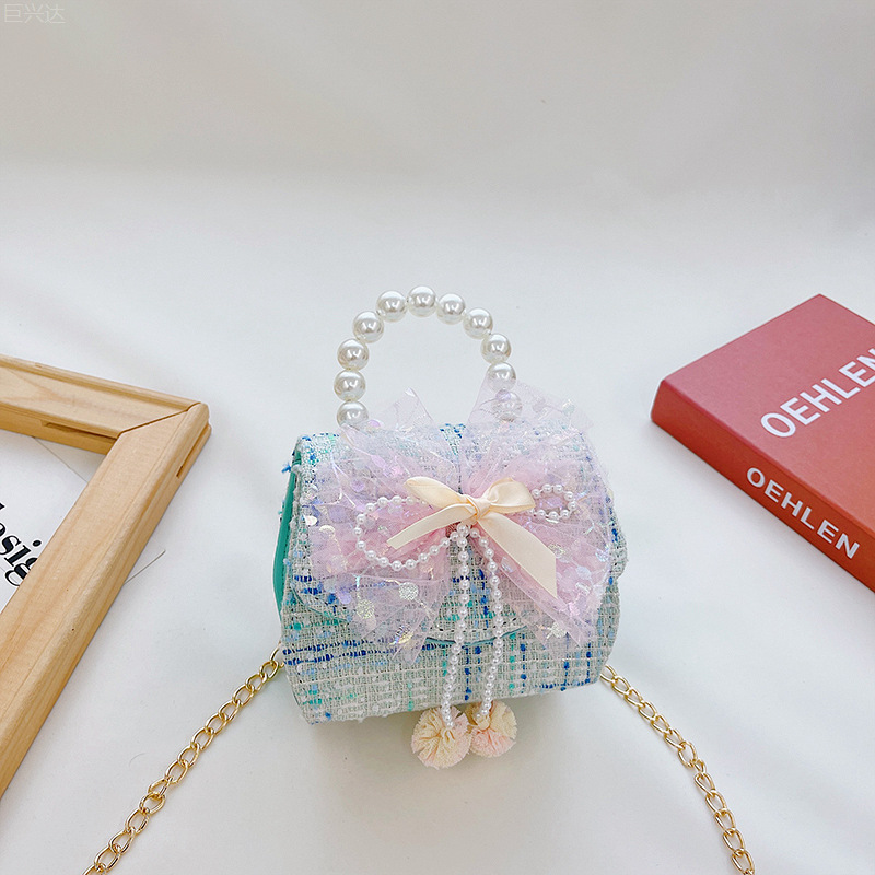 Bolsa de moda para niños 2021 otoño e invierno nuevo algodón y lino de lana estilo Chanel arco perla bolsa de mensajero portátil para niñas