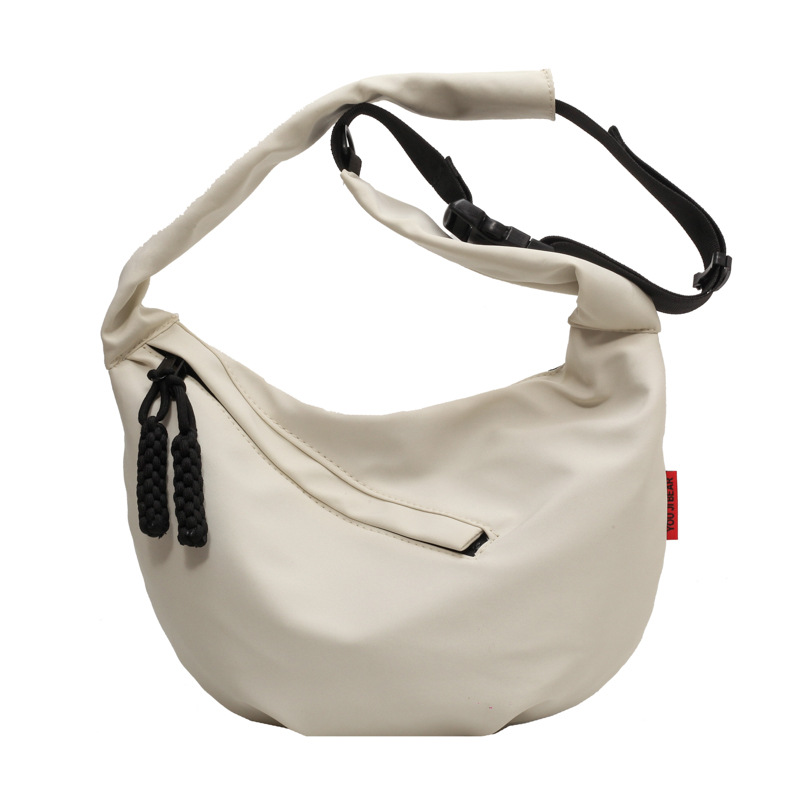 Bolsa de gran capacidad para las mujeres 2023 nueva bolsa de hombro casual estilo coreano color sólido bolsa de mensajero moda estudiante bolsa de nylon dumpling