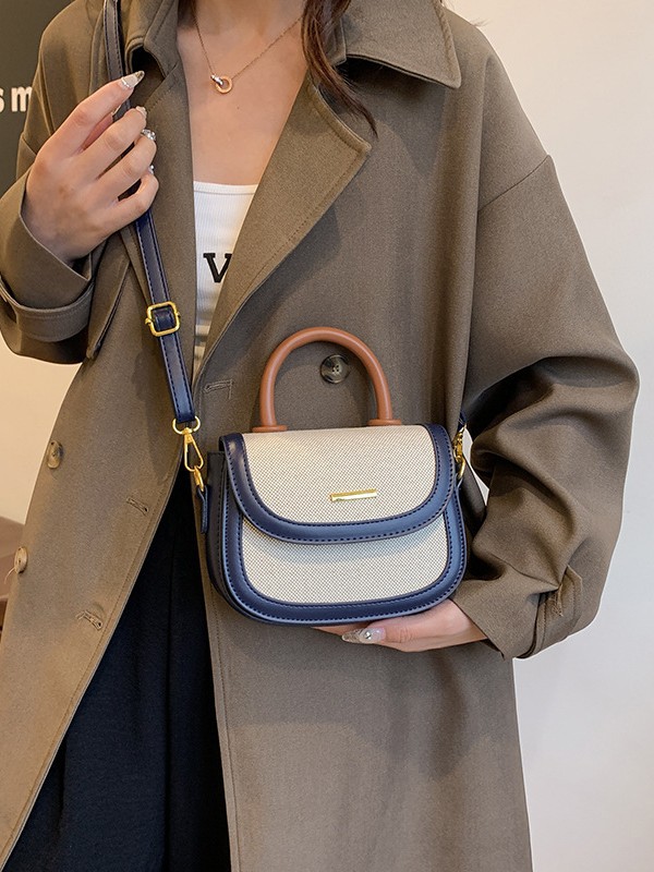 Bolsos de silla de mano de alta textura para mujeres 2026 nueva moda transfronteriza retro color contrastante empalme mochila de hombro