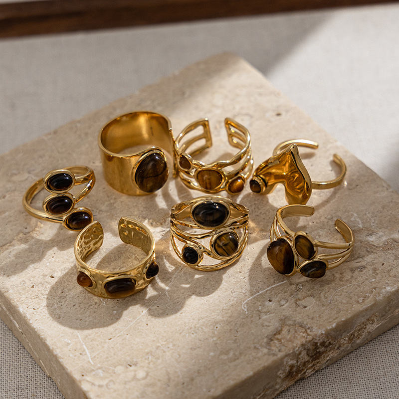 Anillo de piedra de ojo de tigre de acero inoxidable TENA de Europa y los Estados Unidos exagerado alto nivel de explosión transfronteriza anillo de nicho de titanio no se desvanece