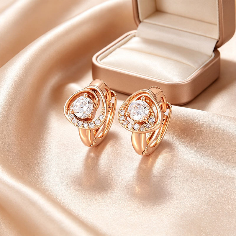 Pendientes de aro Xuping transfronterizos rusos de 18k con incrustaciones de diamantes, joyería de lujo ligero de alta gama al por mayor para mujer.