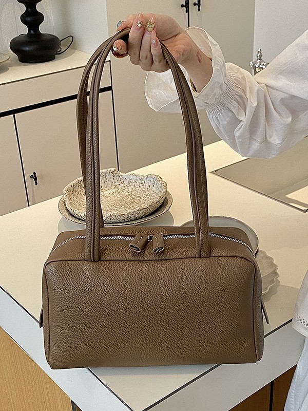 Bolso para mujeres 2026 nuevo nicho coreano litchi pattern commuting versátil bolso de hombro portátil brazo bolso casual