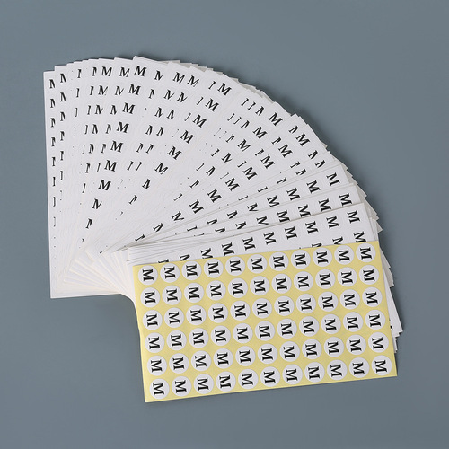 Circular white background, black text manufacturer's digital label size sticker for clothing and shoe size markings, wholesale