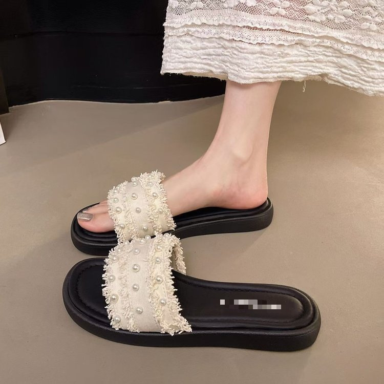 Zapatillas de perla con sandalias de falda 2026 verano nuevo tacones bajos casuales cómodas zapatillas de viento