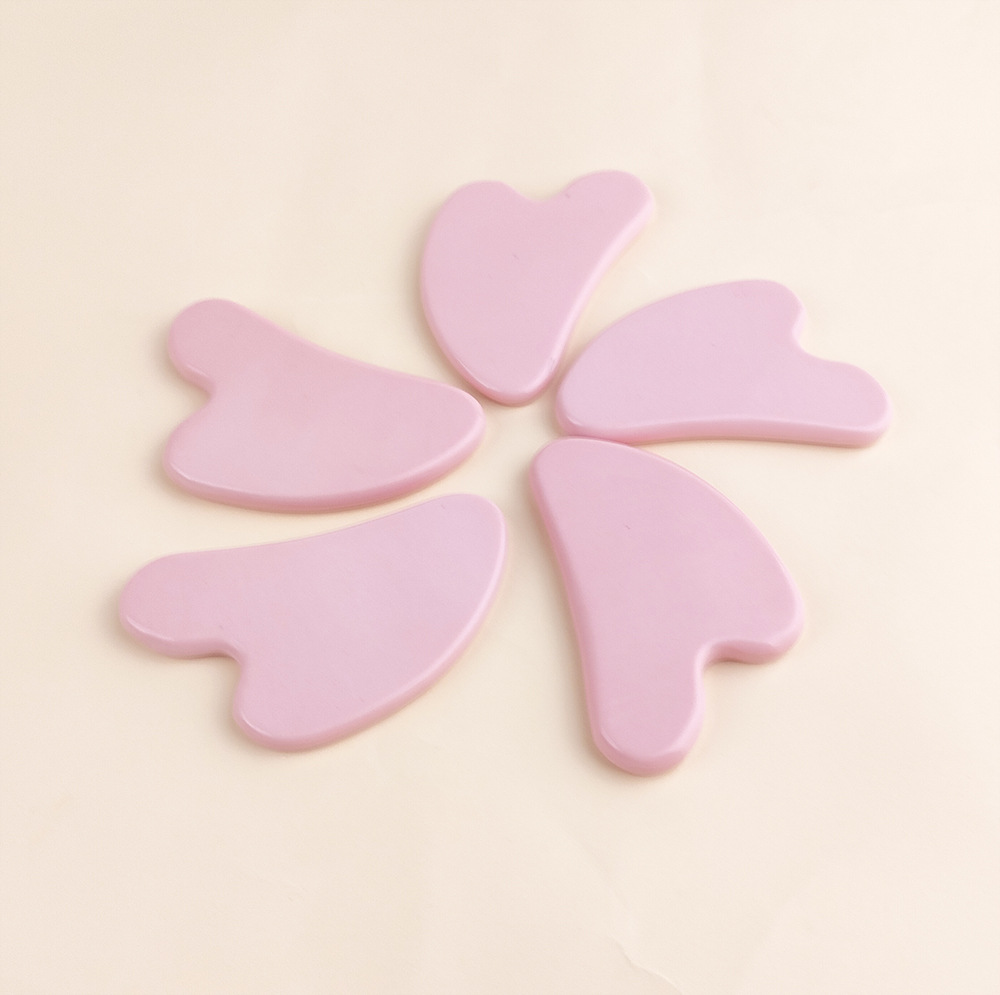 批发定制粉色无孔陶瓷刮痧板 面部美容紧致拨筋心形陶瓷刮痧