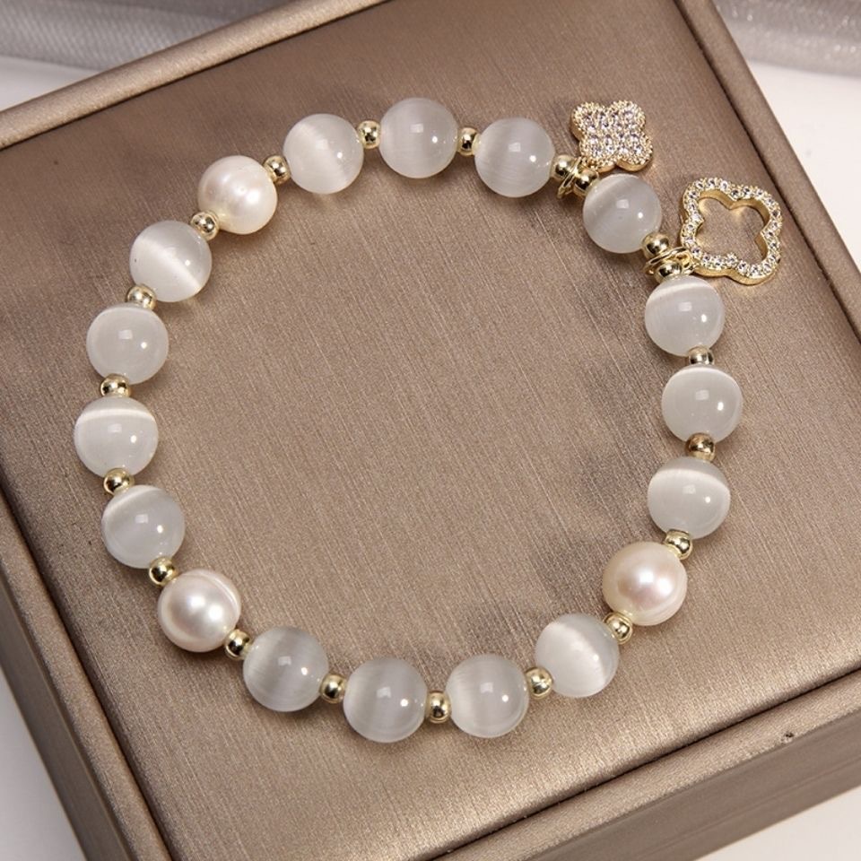 2025 nuevo ojo de gato piedra de cuatro hojas pulsera de vidrio pulsera de perlas de nicho