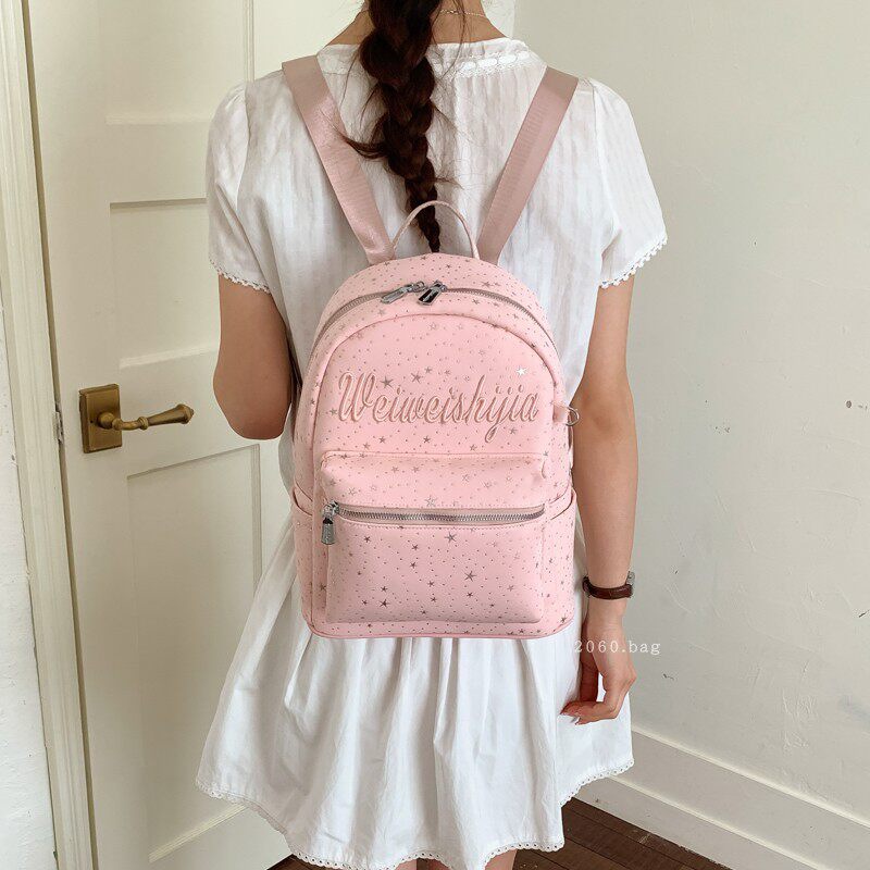 Mochila de moda mochila 2026 mochila de gran capacidad para estudiantes universitarios en clase nueva primavera bolsa de letras lienzo para mujeres