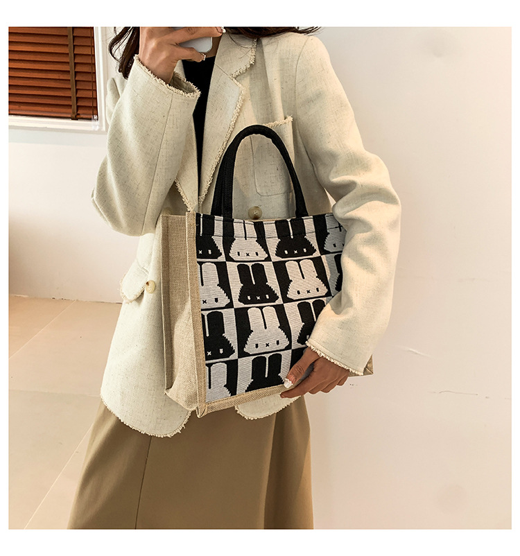High-end mid-capacity canvas school commuting handbag 2024 new style fashionable and versatile linen single-shoulder tote bag Item Picture