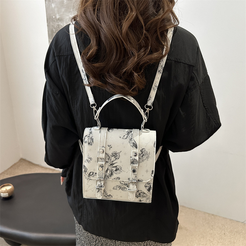 2024 nueva impresión universal mini bolso nuevo estilo chino chino de alto nivel de estilo extranjero nicho mochila mujer