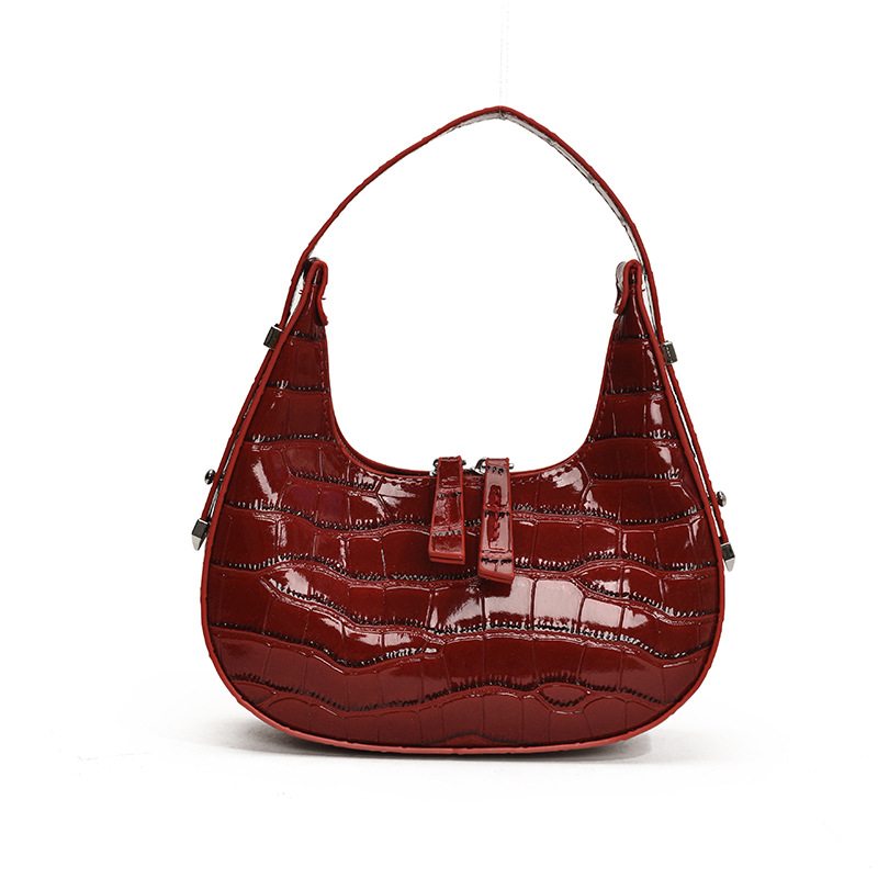 Bolso de axila con textura transfronteriza 2025 primavera nuevo bolso femenino bolso retro con patrón de piedra bolso de hombro brillante de charol