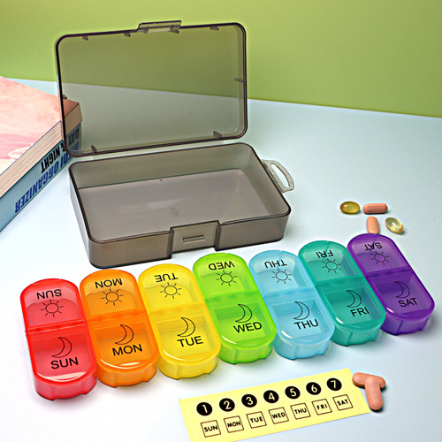Pill organizer for 7 days 14 compartments, dustproof storage box, split into 7-day pill boxes for daily medication distribution.
