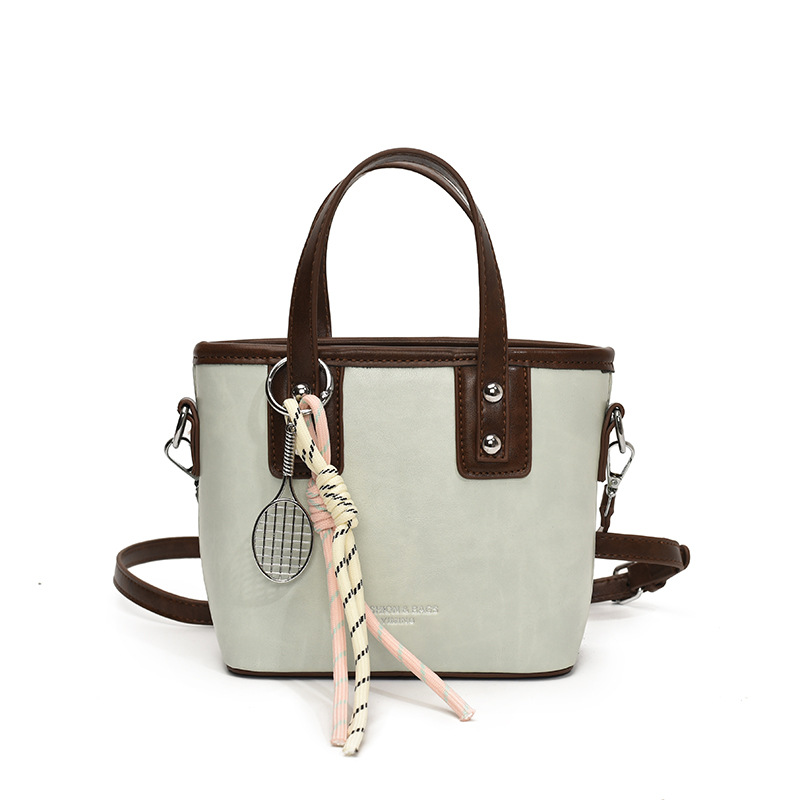 Bolso de mano de alta gama de nicho para mujer 2025 nuevo bolso de hombro de todo fósforo de color en contraste bolso de cubo de mensajero súper caliente de moda