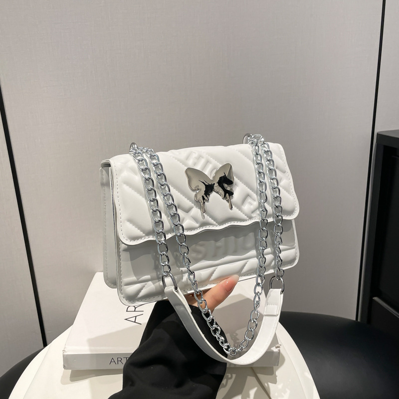 Casual simple color sólido moda 2025 nueva cadena de moda diamante hombro de mano bolso pequeño para mujeres