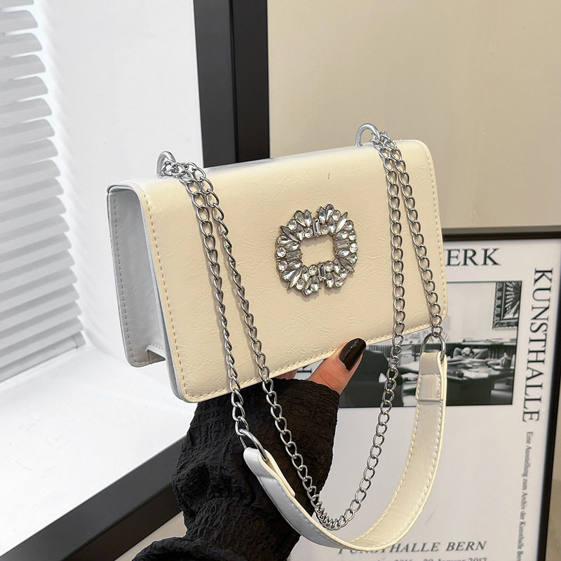 Bolsa cuadrada de diamante de alta calidad para mujeres 2024 otoño nueva moda coreana de textura universal cadena de hombro mochila