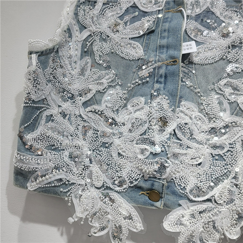Estación europea 2026 principios de verano nueva industria pesada sequinilla perlas de clavos flores sin mangas chaleco de vaqueros de mujer abrigo corto