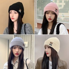 女性の秋冬のかわいい耳保護ウール帽子、サイクリング多用途ニット帽、クマの帽子、顔が見える小さな産後帽子、トレンディなカップル