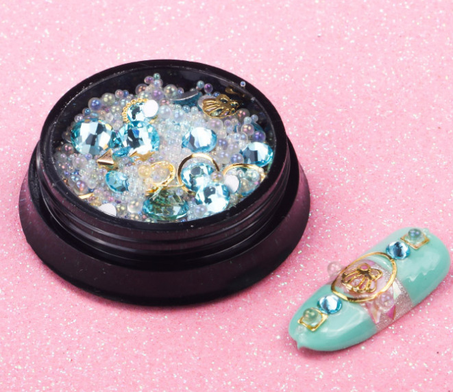 Joyas de belleza de uñas de la estrella y la luna, remaches de estampado de oro, bolas de acero mezcladas con anillo de metal, diamante de agua, diafragma de aleación hueca japonesa