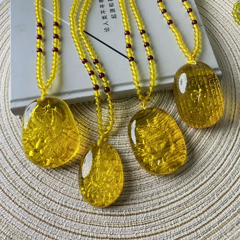 金琥珀蜜蜡内雕心经千手观音阴雕吊坠项链直播货源水滴佛项链批发
