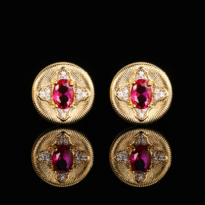 Otoño e invierno nuevo estilo Zhuang Shengsheng joyería fondo de cobre chapado en oro nueva simulación corindón rojo cristal puntiagudo azul piedra redonda retro 5*7