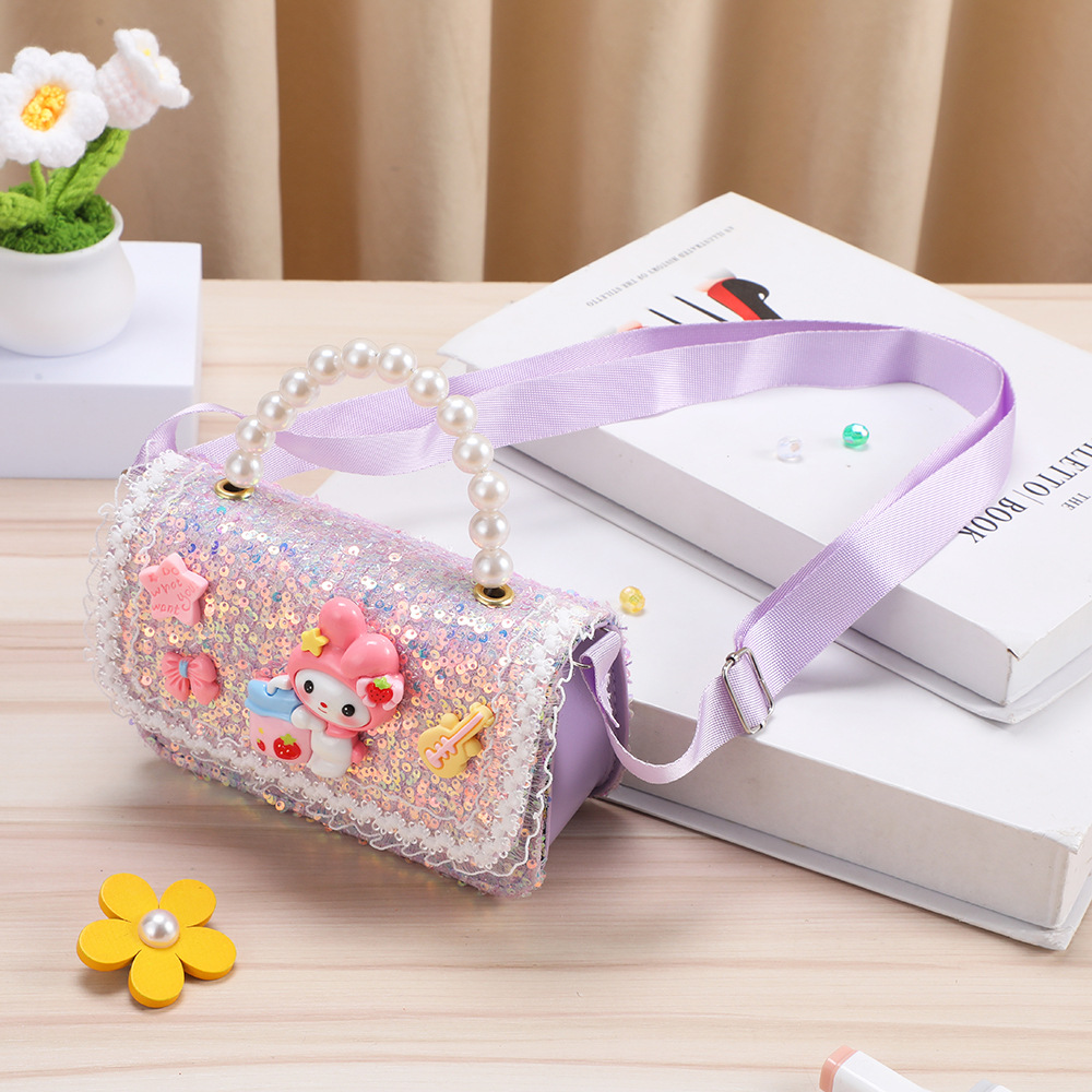 Monedero infantil con lazo, mochila pequeña, bolso bandolera de dibujos animados My Melody para niña, lentejuelas que reducen el peso