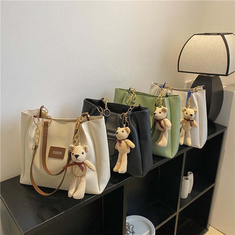 Bolsa de asas de gran capacidad de textura popular de este año para mujeres 2023 nueva moda casual estudiante bolsa de clase bolsa de cercanías