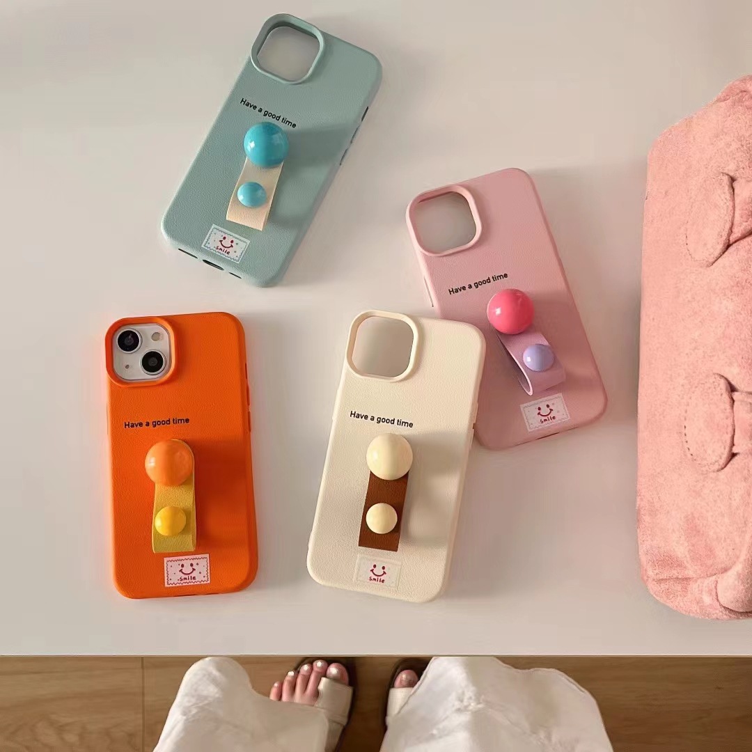 Botón de dedo de bola tridimensional de color sólido simple ins para iPhone15ProMax Apple 13/12 funda para teléfono móvil 14 mujer