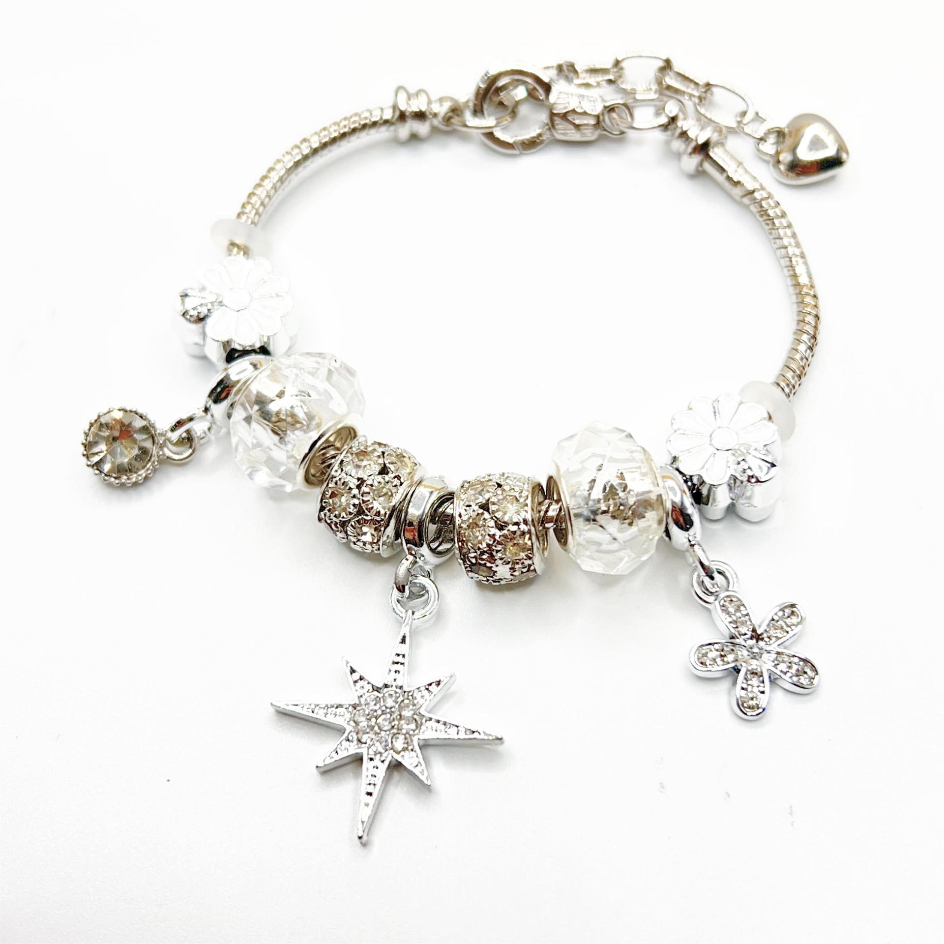 Bracciale in argento con ciondolo farfalla e cuore per donna_voghion.com