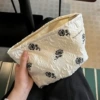 White small clutch bag with diamond pattern
