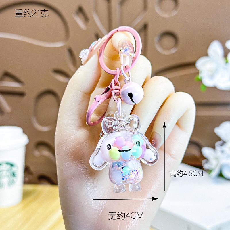 Caricatura creativa adorable acrílico frijoles de azúcar fluir arena jade Gui perro llavero colgante adornos puestos de productos al por mayor