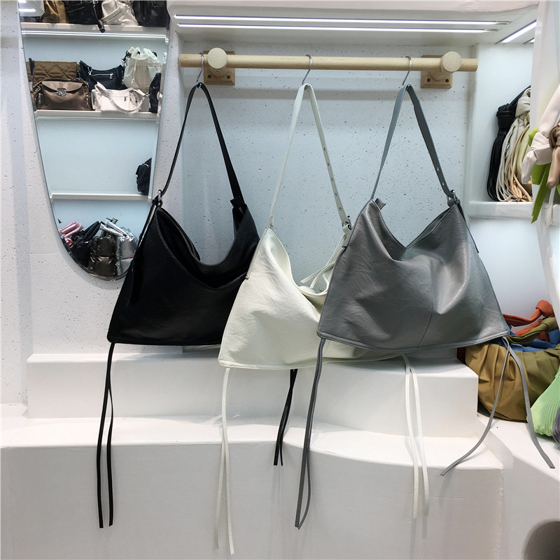 Bolso de borla texturizado de moda casero de esta temporada ligero bolso de mano crossbody de hombro de moda casual del todo fósforo