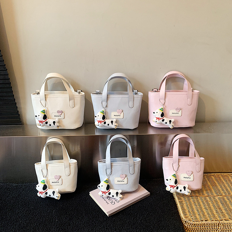 Bolso de moda coreano para niños y niñas simple color sólido pequeño y ligero bolso de cestas de bebés nuevos accesorios para niños bolso